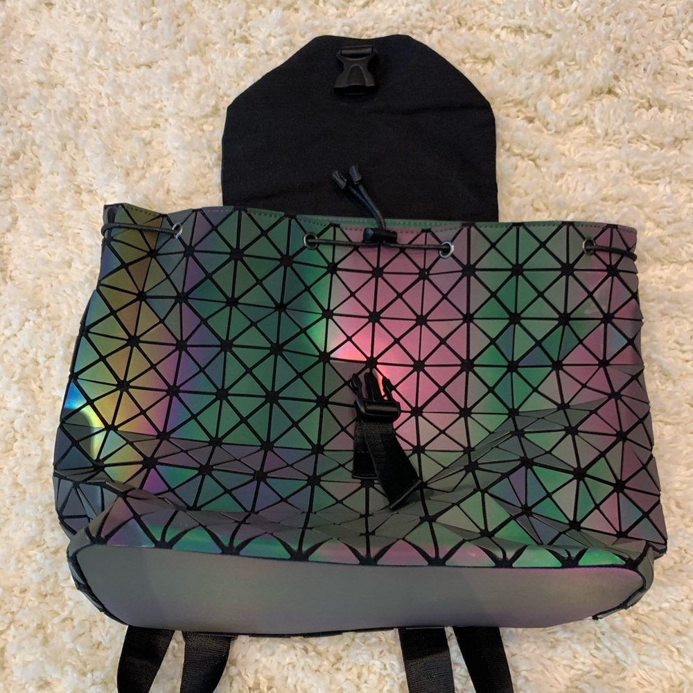 Never worn geometric holographic backpack.